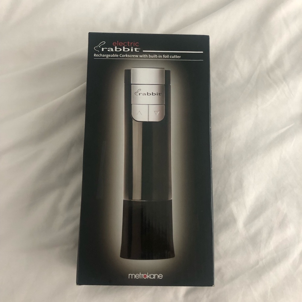 NWOT Metrokane electric rechargeable wine opener. Never used.